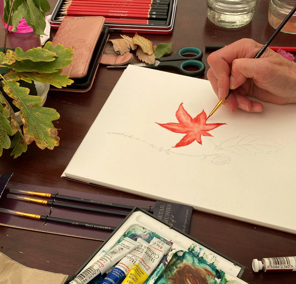 Botanische kunst workshop in actie - deelnemers leren mixed media technieken